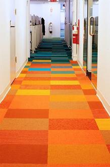 Beautiful playful effects with different color carpet tiles