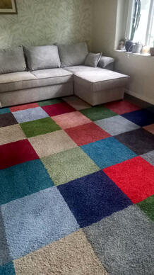 A gorgeous mix of high-pile carpet tiles in cheerful colours, perfect for creating a cosy, homely atmosphere.